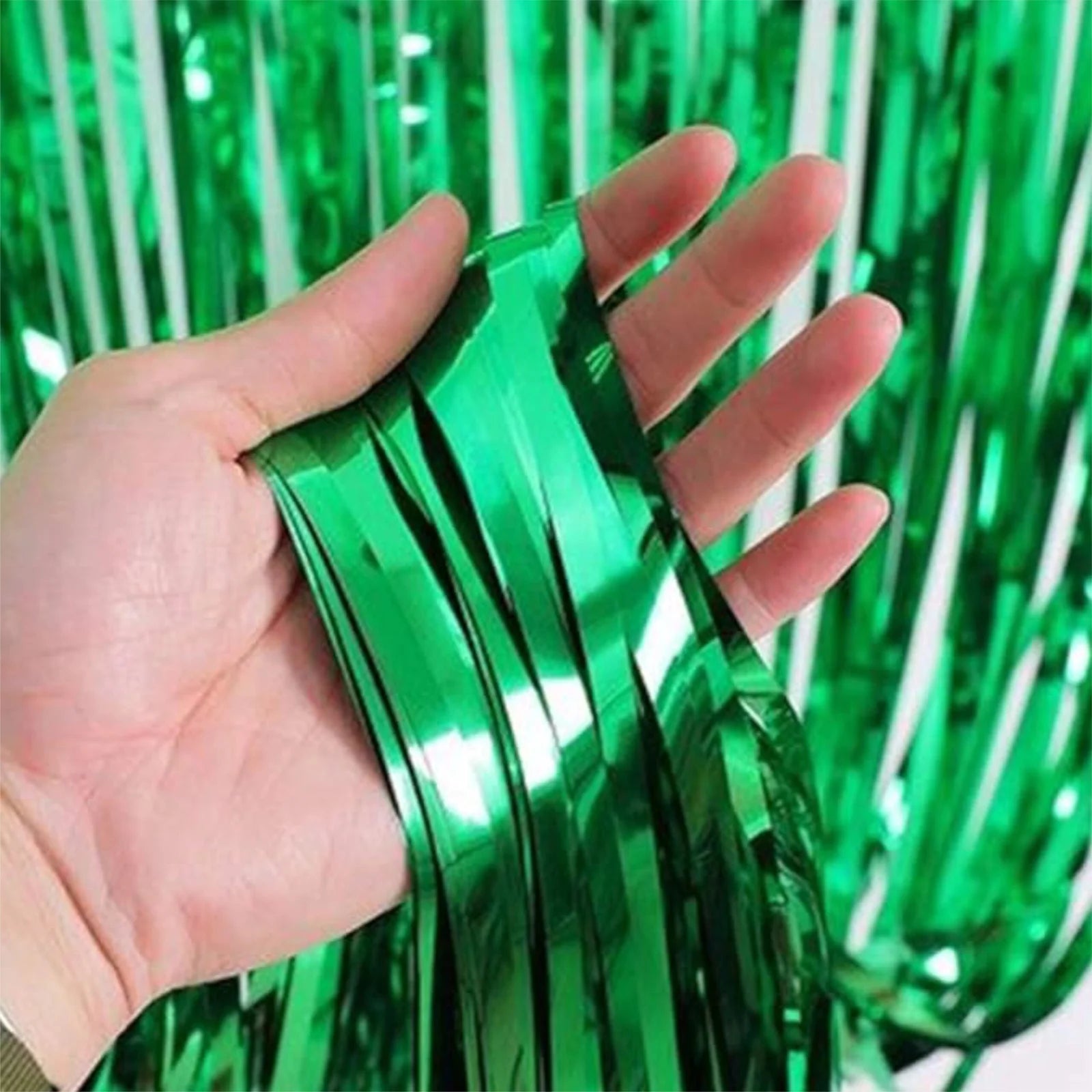 Shiny green metallic fringe curtain backdrop 36 x 96 in
