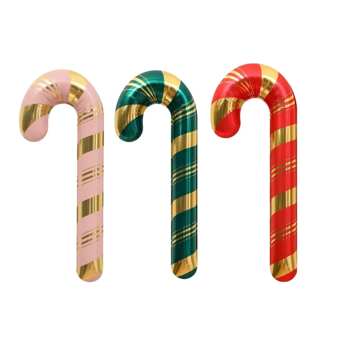 Pink and gold candy cane foil balloon with pastel stripes, Christmas decoration for parties and balloon setups.