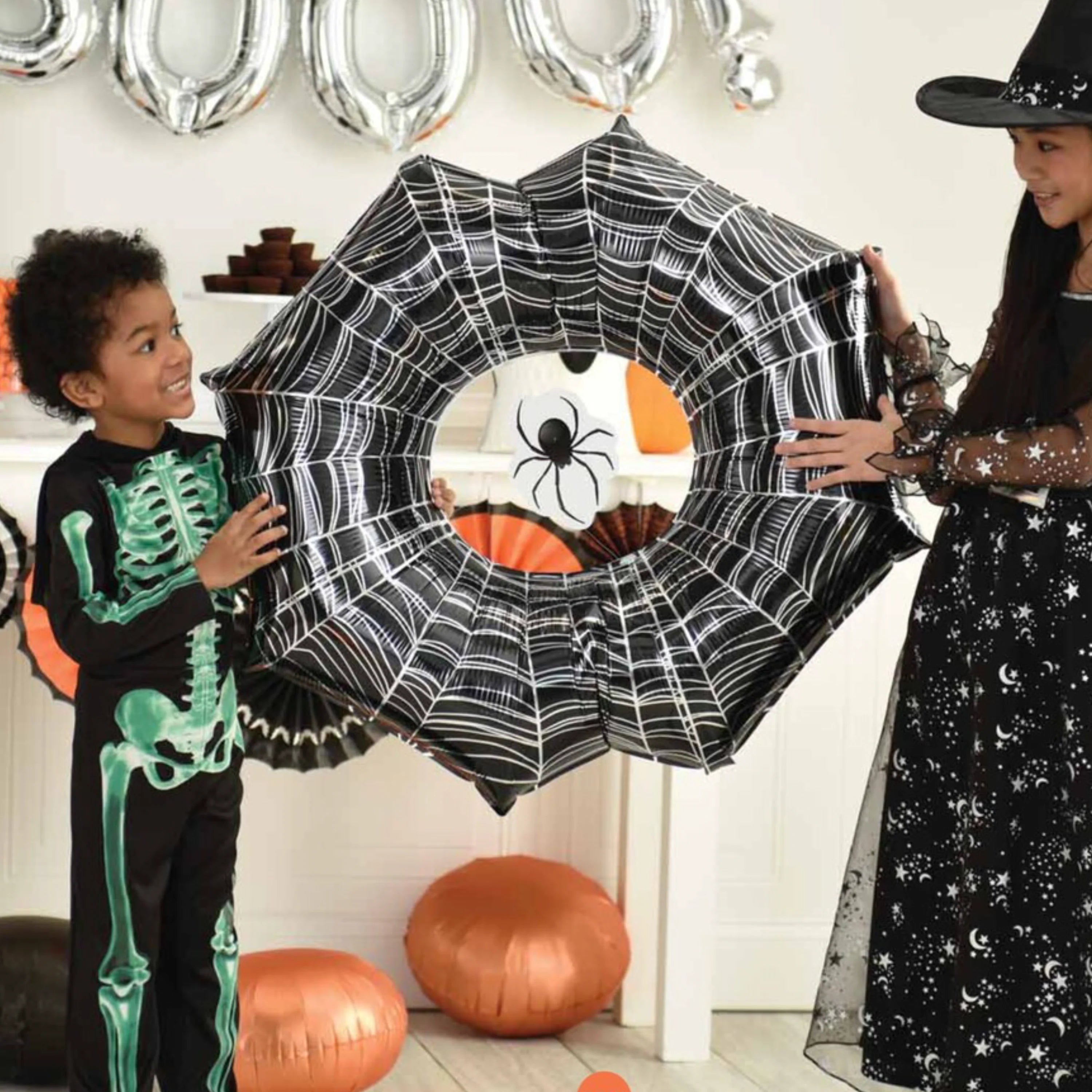 Giant foil balloon shaped like a spider web with a creepy spider – 33 x 32 in – Halloween decoration