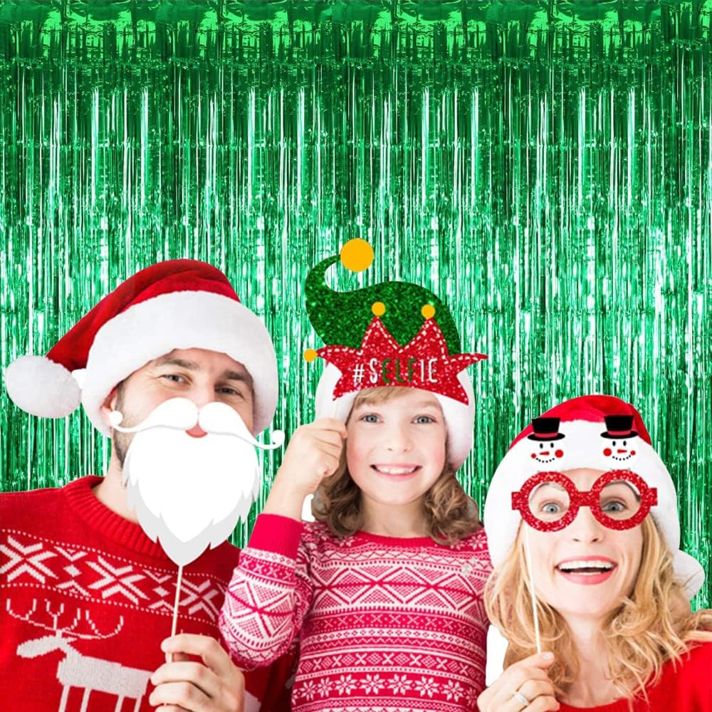 Christmas party decoration with glossy green foil fringe curtain