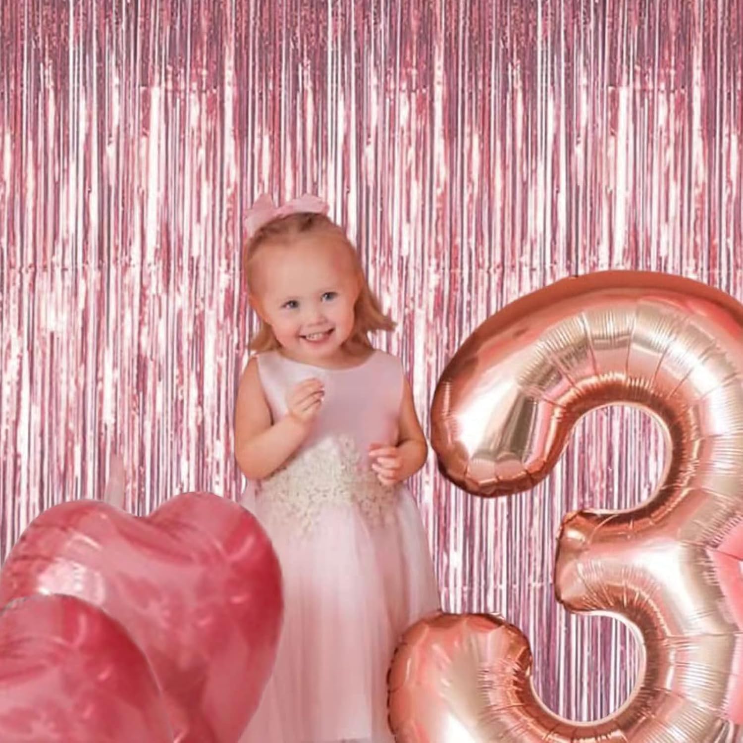 “Rose gold foil fringe curtain backdrop with birthday balloons photo booth”