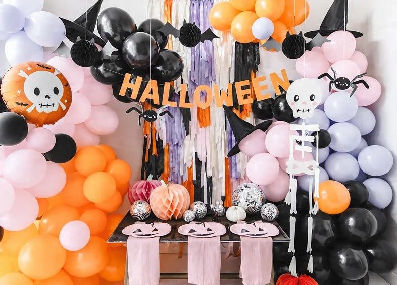 "Skull foil balloon in balloon arch Halloween decor"