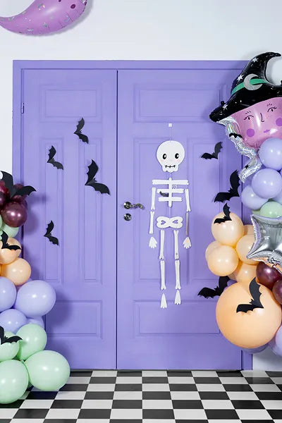 "Colorful skeleton with balloons and bats"