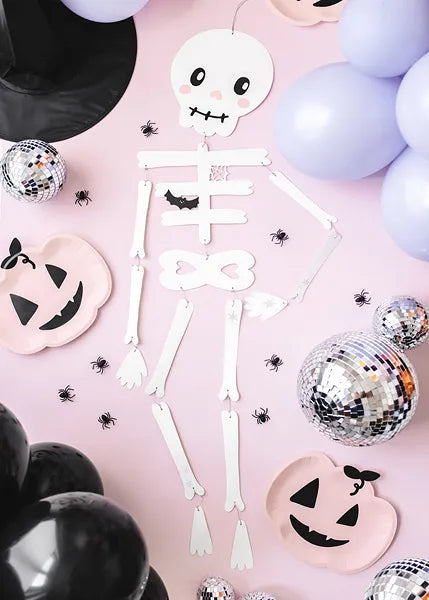 "Pastel Halloween skeleton hanging decoration"