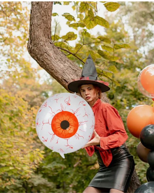 "Halloween outdoor decoration with giant eyeball balloon"