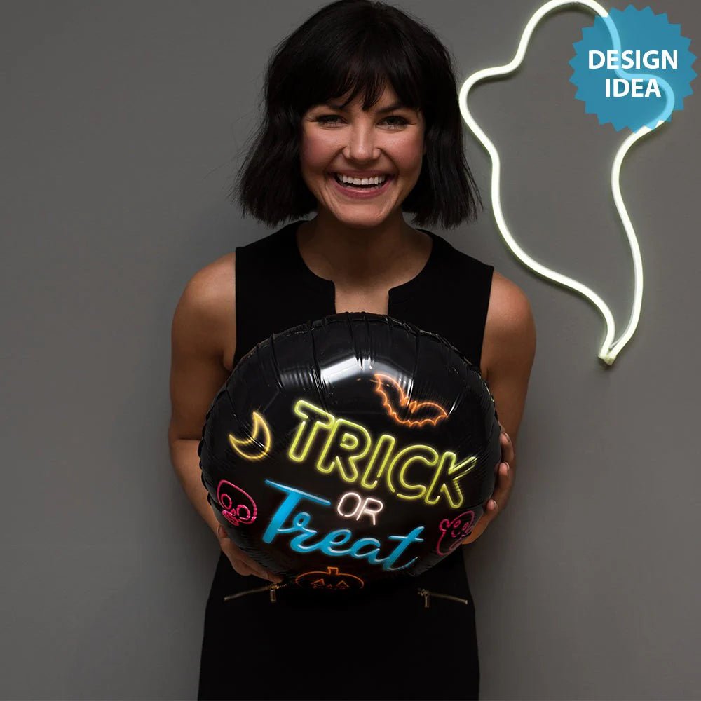 "Trick or Treat 17 inch round foil balloon with neon Halloween design"