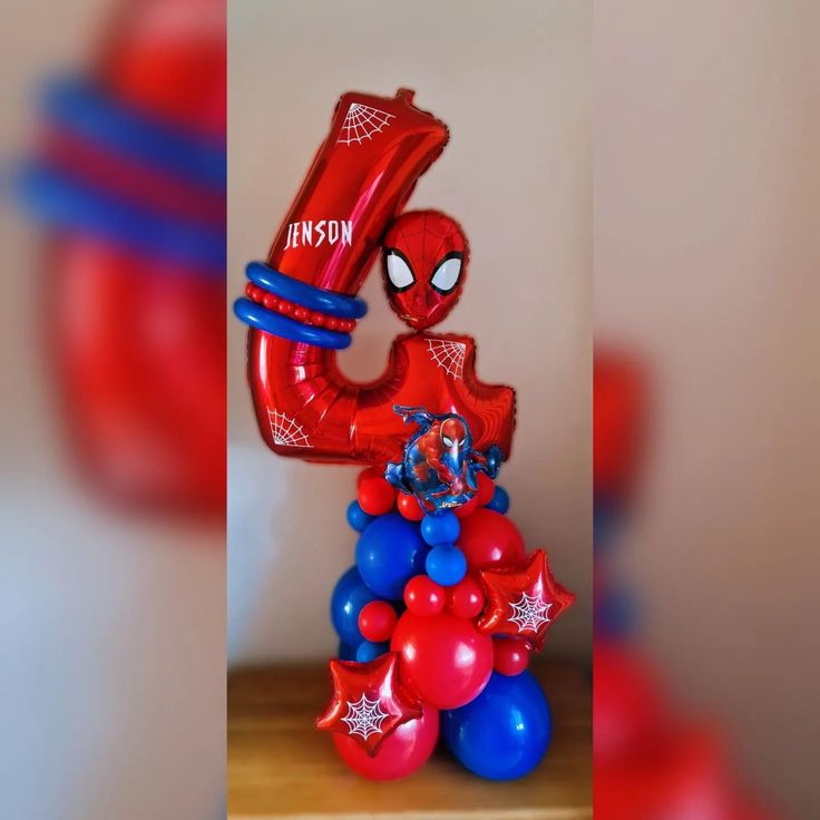 "Spider-Man balloon on birthday number 4 column decoration"