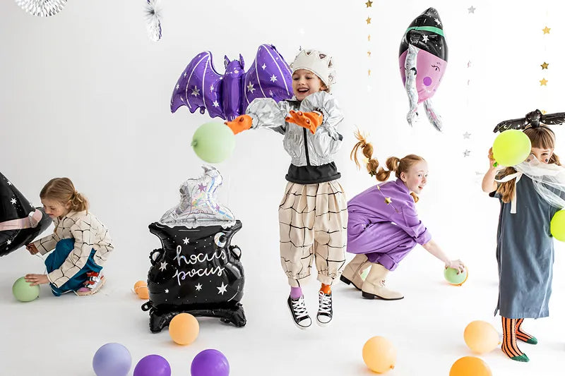 Kids party with holographic Halloween foil balloon