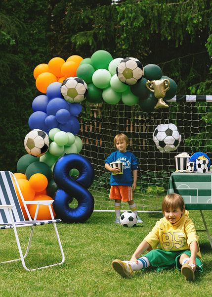 Foil balloons trophy with soccer balls for garlands decoration