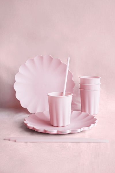 Pink plastic cup with frill detail for pastel party decorations and events

