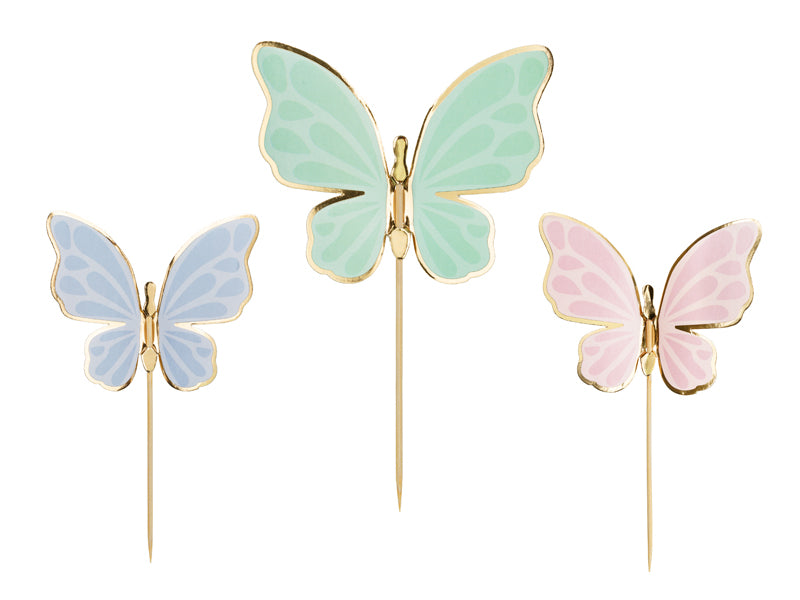 Pastel butterfly cake toppers with gold accents for birthdays and fairy-themed parties