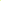 Vibrant light green rectangular tablecloth draped over a wooden table.