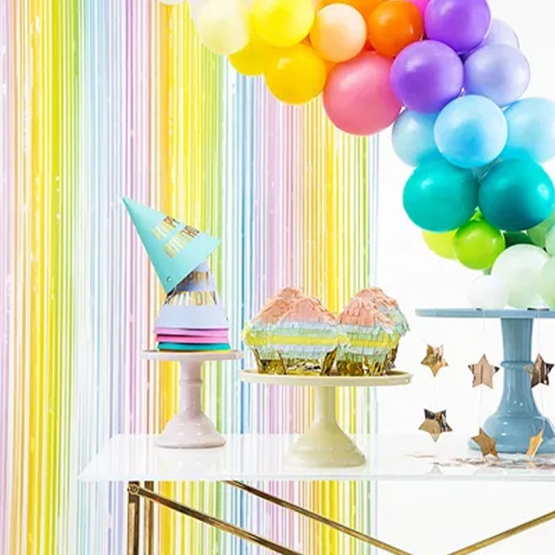 “Foil curtain backdrop in mixed pastel colors”