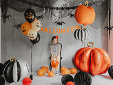 Orange foil pumpkin balloon with gold stem, used for Halloween or fall décor