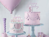 Purple acrylic Happy Birthday cake topper in script font for pastel birthday decoration