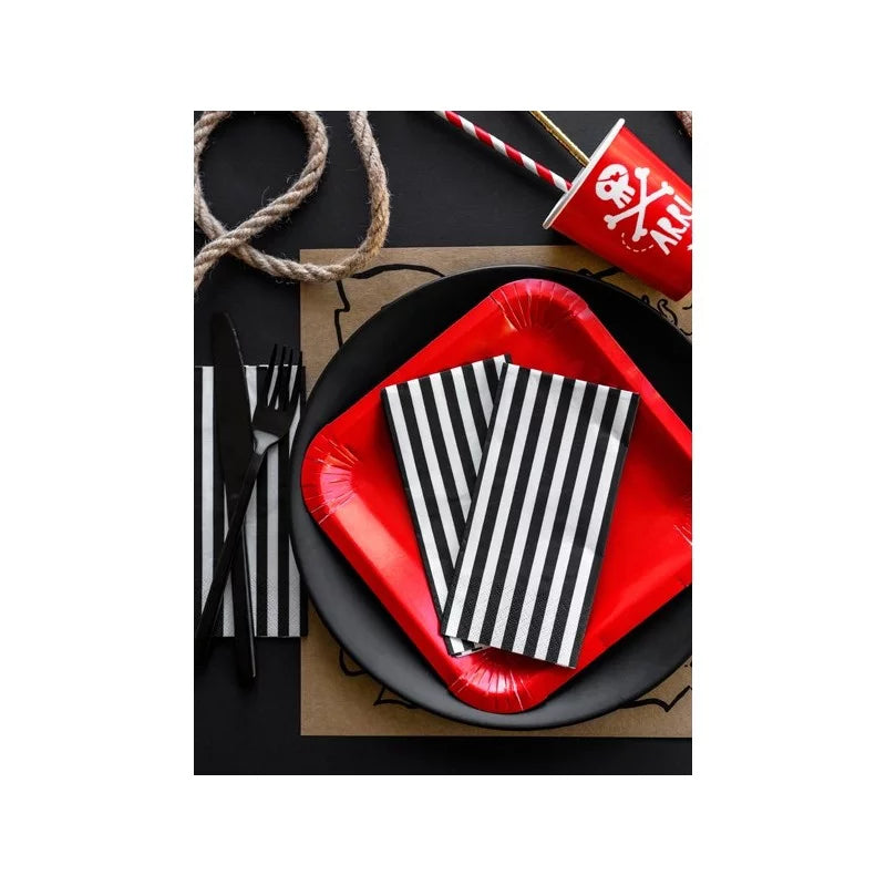 "Napkin on red plate with Halloween table setting"