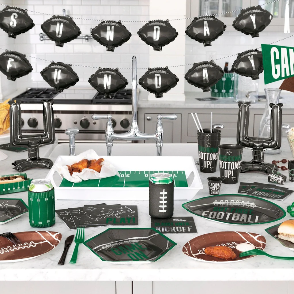 “Football goalpost standing centerpiece, for sports party table décor.”