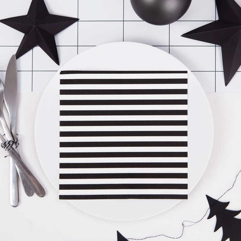 "Striped napkins with modern monochrome party decor"