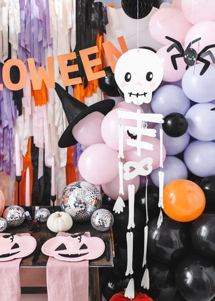 "Skeleton mix decor with fun Halloween elements"